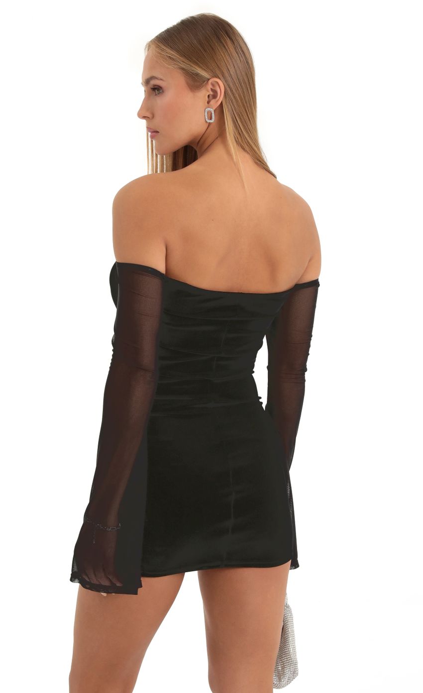 Picture Gianni Velvet Off The Shoulder Dress in Black. Source: https://media.lucyinthesky.com/data/Dec22/850xAUTO/c92e04c3-6bf2-49e6-b6cd-d0ee4f8ba09b.jpg
