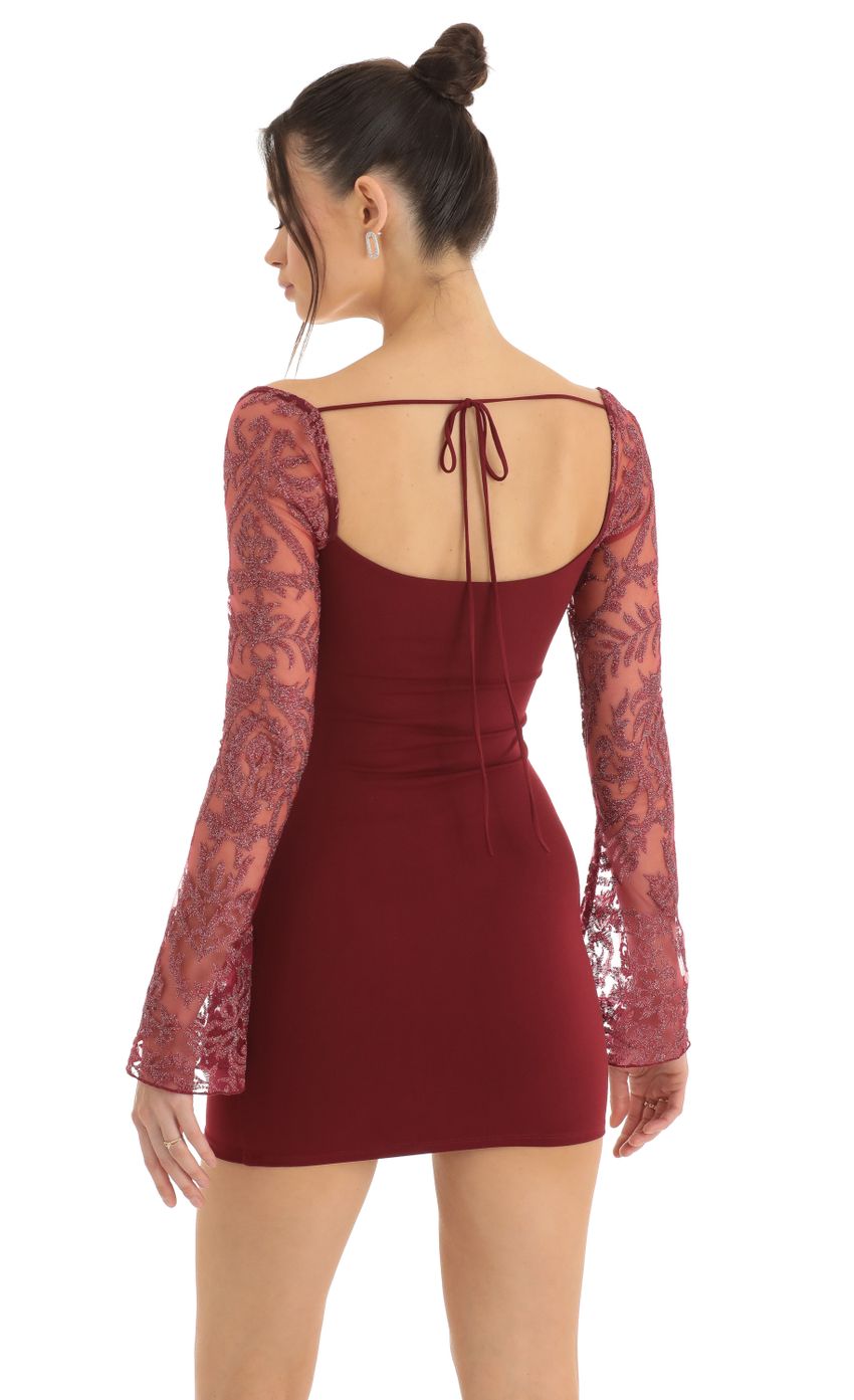 Picture Paola Tulle Embroidered Long Sleeve Bodycon Dress in Red. Source: https://media.lucyinthesky.com/data/Dec22/850xAUTO/e8b9f137-acfb-45b7-b3e5-a08f96f9012c.jpg