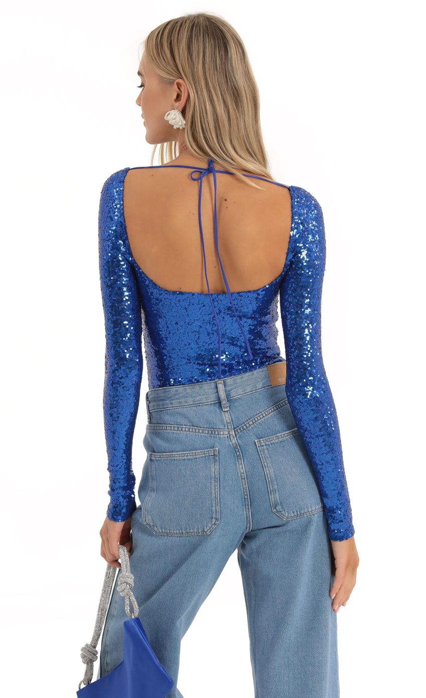 Picture Aislin Sequin Long Sleeve Bodysuit in Blue. Source: https://media.lucyinthesky.com/data/Dec22/850xAUTO/f1374d70-92a9-4019-b465-9567568f395a.jpg