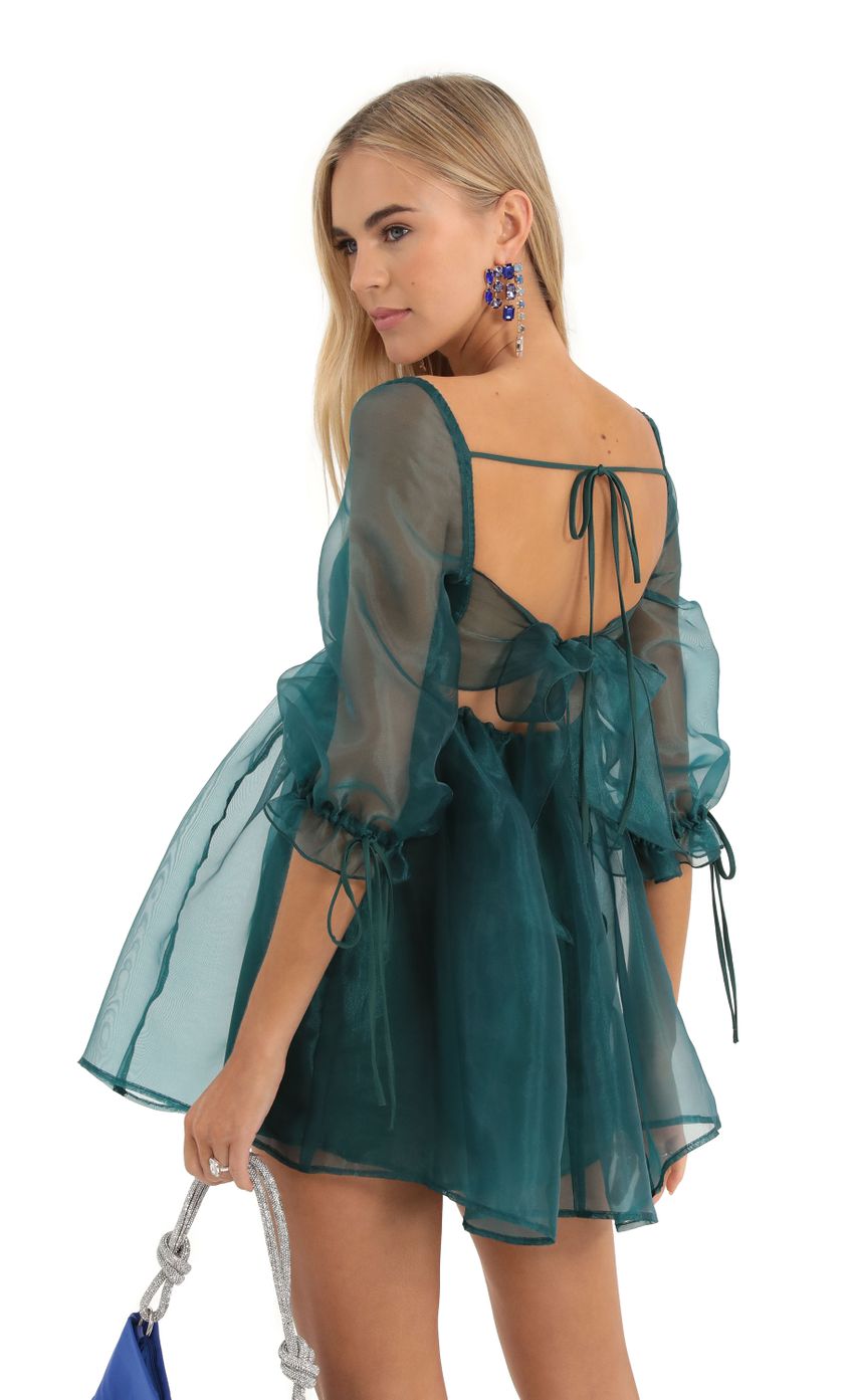 Picture Lula Puff Sleeve Baby Doll Dress in Green. Source: https://media.lucyinthesky.com/data/Dec22/850xAUTO/f56512ac-f7f4-4552-a78d-9dd65e70a987.jpg