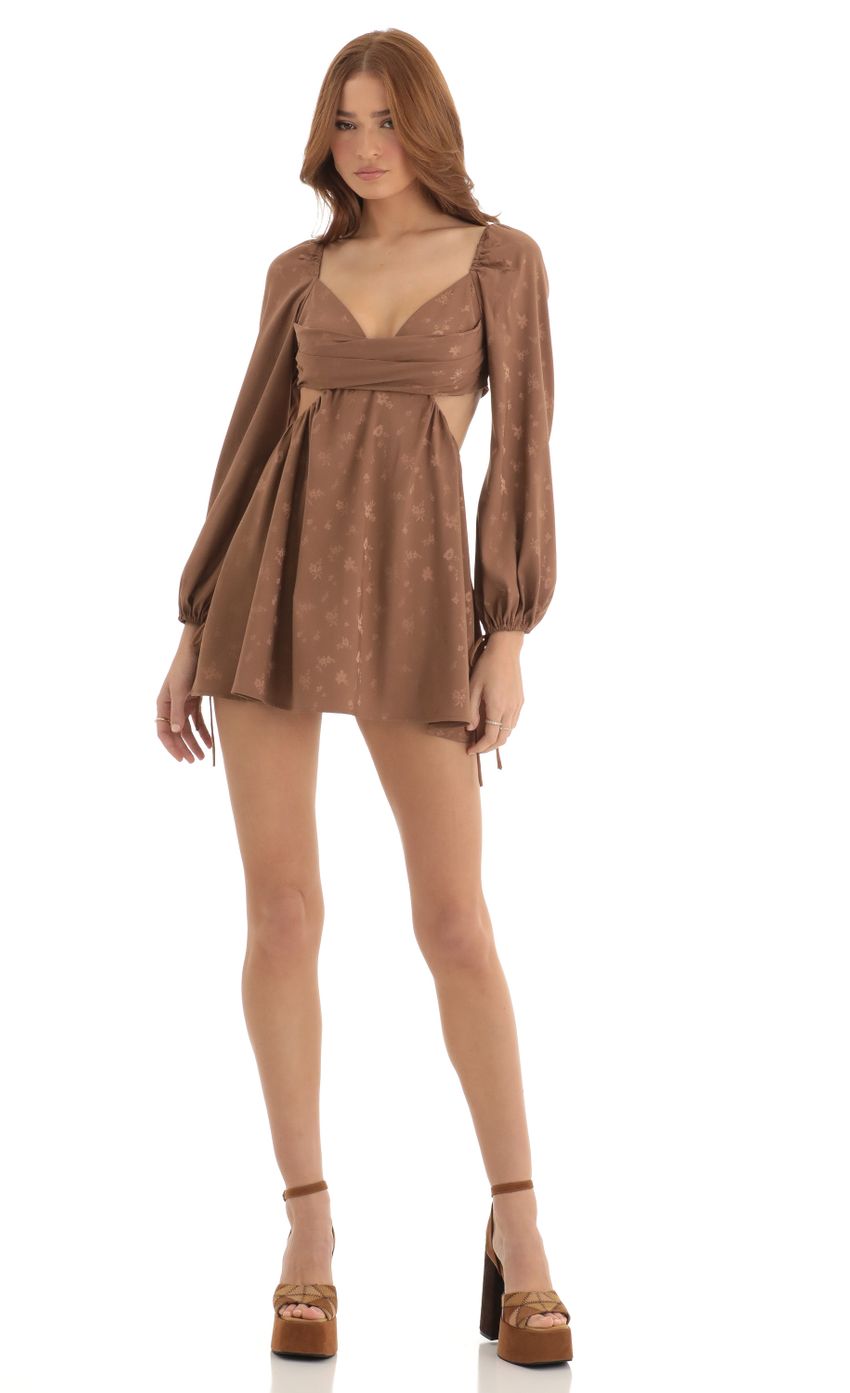 Picture Krista Floral Long Sleeve Fit and Flare Dress in Brown. Source: https://media.lucyinthesky.com/data/Dec22/850xAUTO/ffcb95d1-10af-41d8-ad34-ea5fa8a32429.jpg