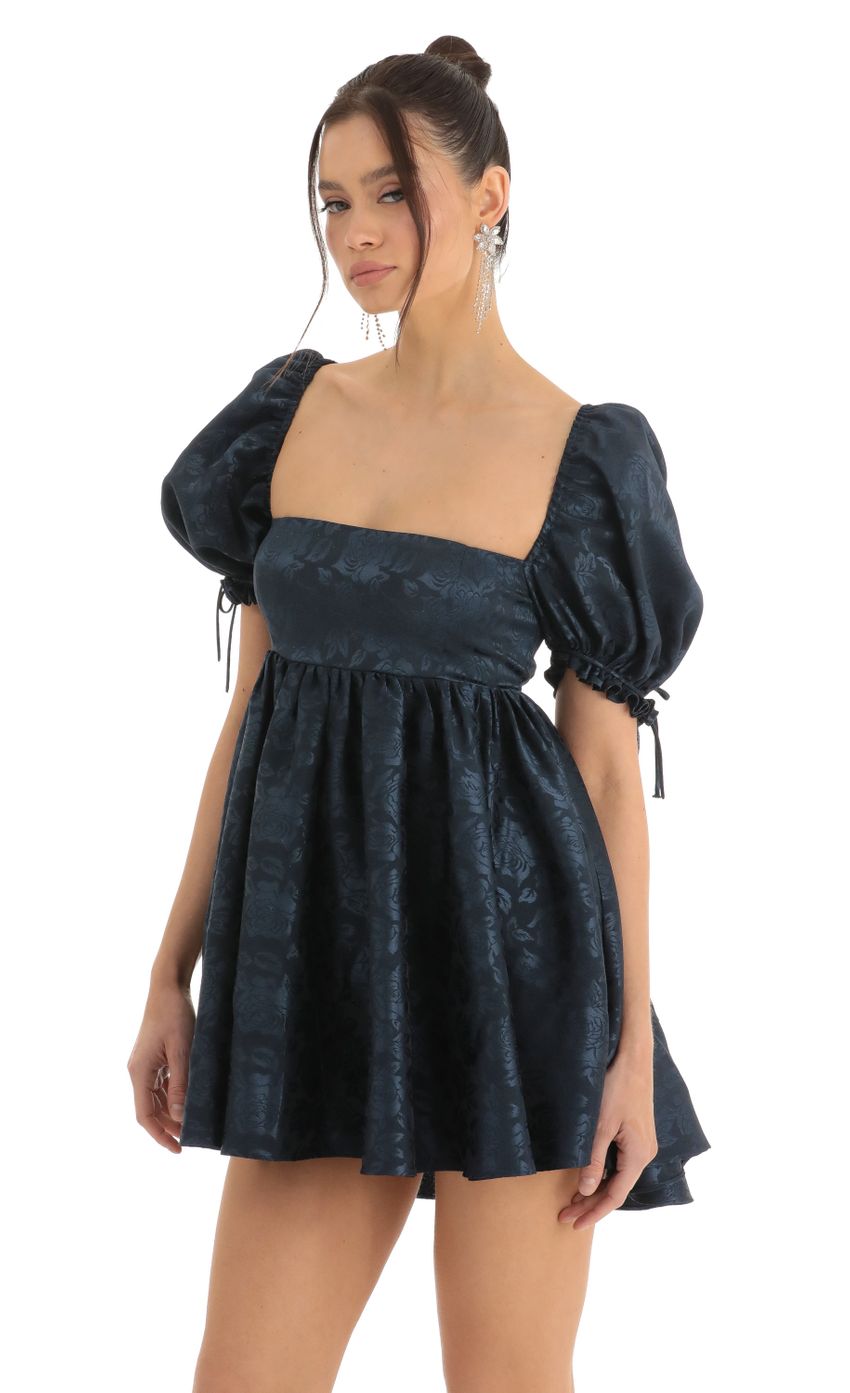 Picture Cheri Floral Jacquard Baby Dolly Dress in Navy. Source: https://media.lucyinthesky.com/data/Dec22/850xAUTO/ffde423f-4845-466d-aab9-f59cfe81c7fc.jpg