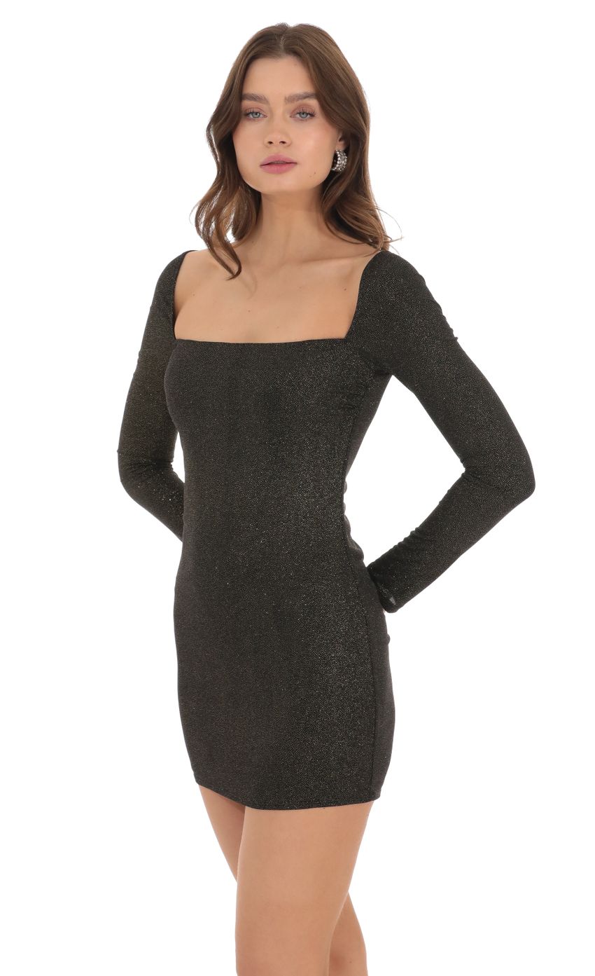 Picture Shimmer Long Sleeve Dress in Black. Source: https://media.lucyinthesky.com/data/Dec23/850xAUTO/31ae1025-55a8-4c4d-bd6c-bef5dd424472.jpg
