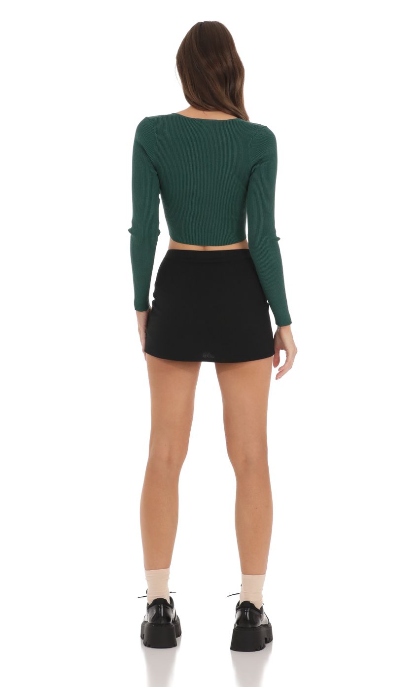 Picture Ribbed V-Neck Crop Top in Green. Source: https://media.lucyinthesky.com/data/Dec23/850xAUTO/340edc57-114d-4374-939c-91e5e71db72c.jpg