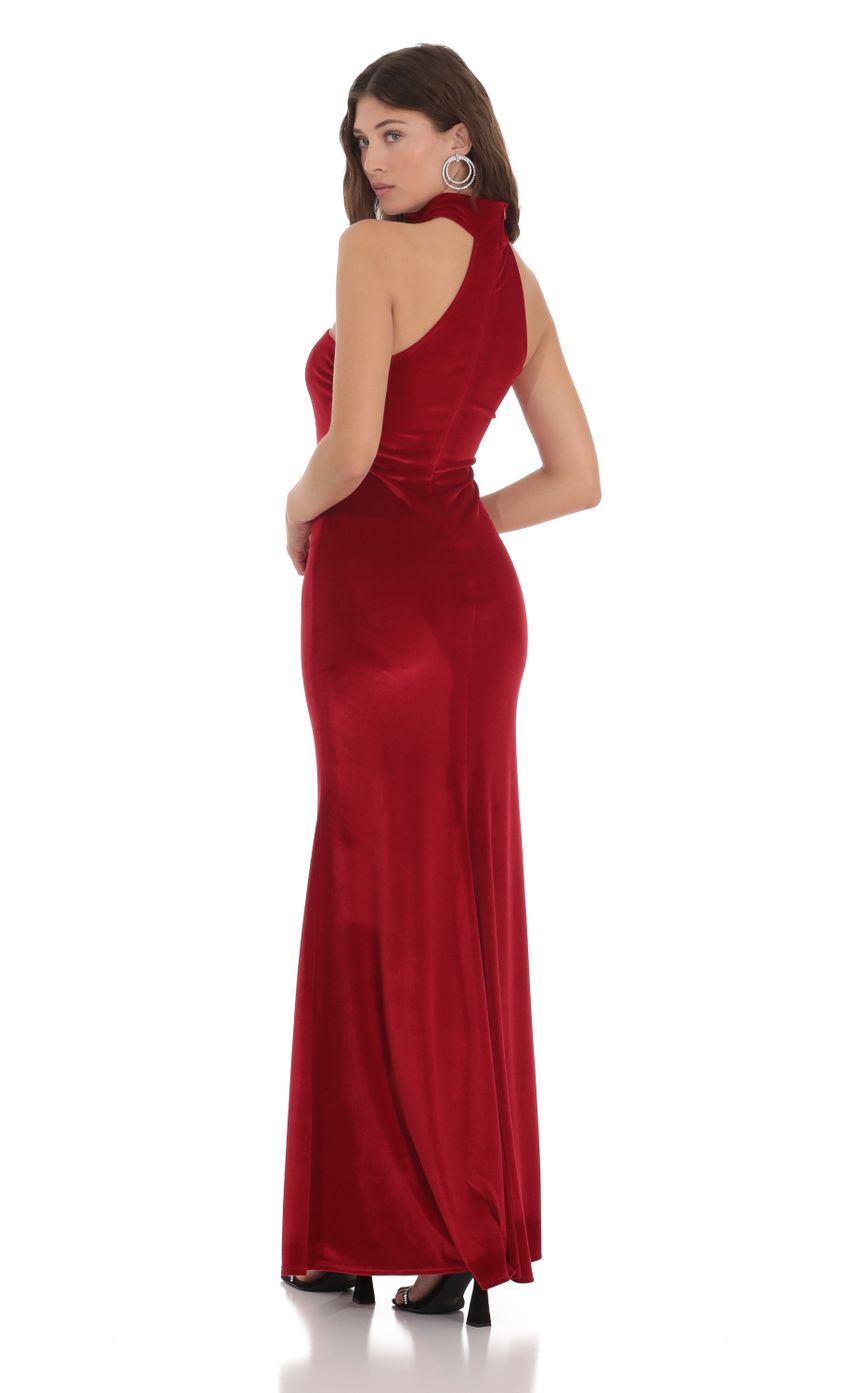 Picture Velvet Reverse Halter Maxi Dress in Red. Source: https://media.lucyinthesky.com/data/Dec23/850xAUTO/54f7b105-eea0-46af-b1d4-912651e77af0.jpg