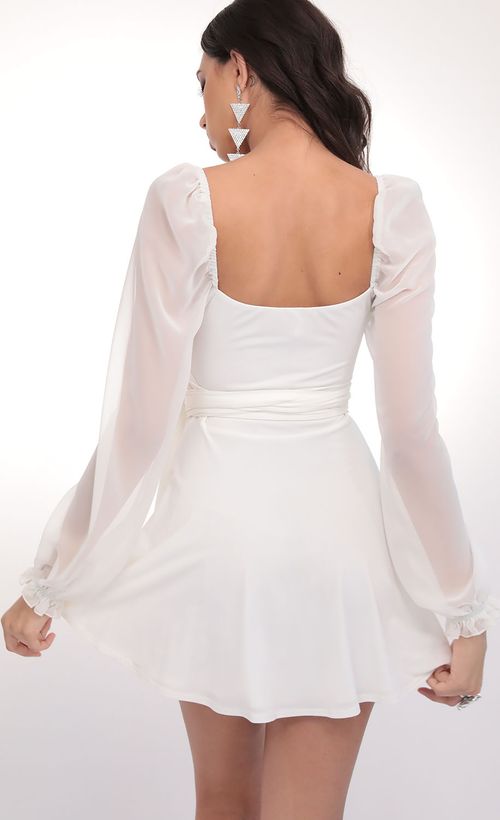 Picture Aliah Puff Chiffon Wrap Dress in Ivory. Source: https://media.lucyinthesky.com/data/Feb20_1/500xAUTO/781A7759.JPG
