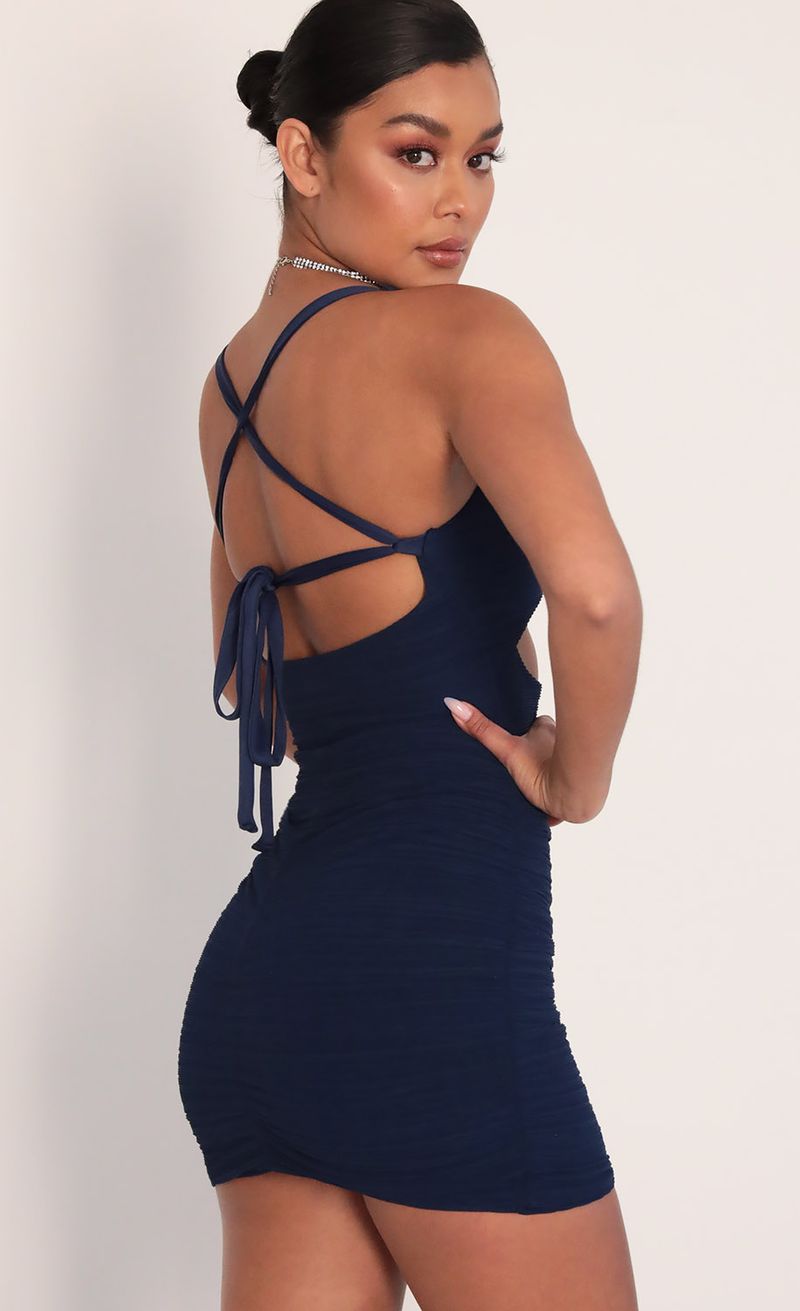 Picture Adria Cut All Ties Pleated Dress in Navy. Source: https://media.lucyinthesky.com/data/Feb20_1/800xAUTO/781A2997.JPG