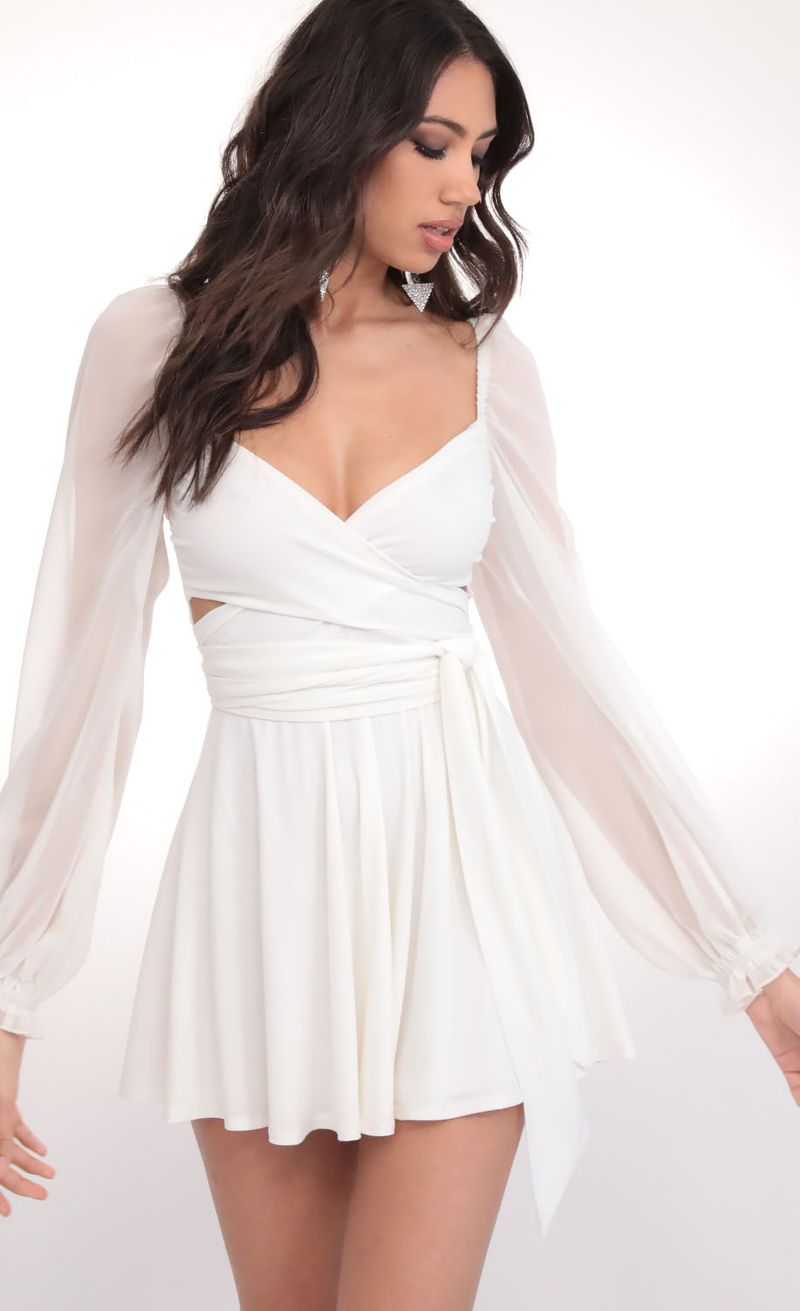 Picture Aliah Puff Chiffon Wrap Dress in Ivory. Source: https://media.lucyinthesky.com/data/Feb20_1/800xAUTO/781A7720.JPG