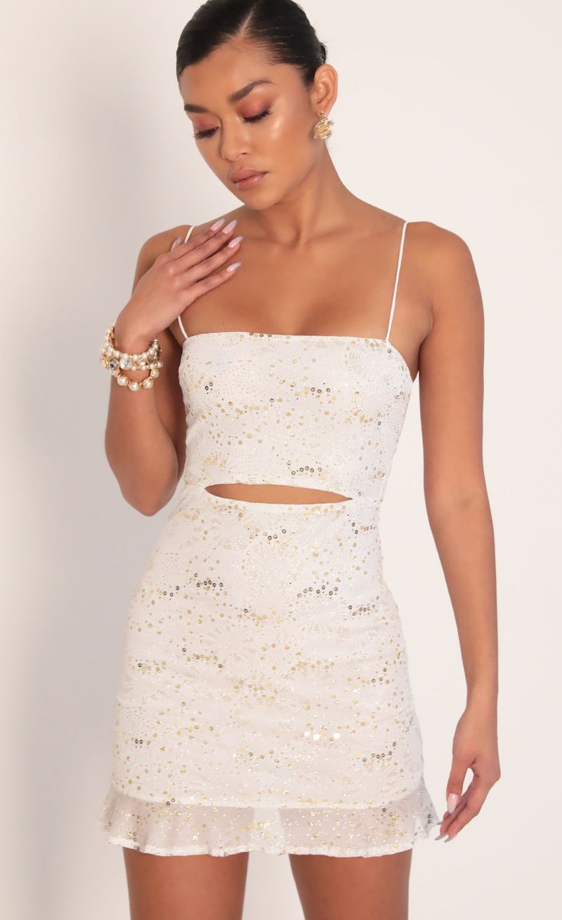 Picture Rae Cutout Ruffle Dress in Ivory Gold. Source: https://media.lucyinthesky.com/data/Feb20_1/800xAUTO/781A9033.JPG