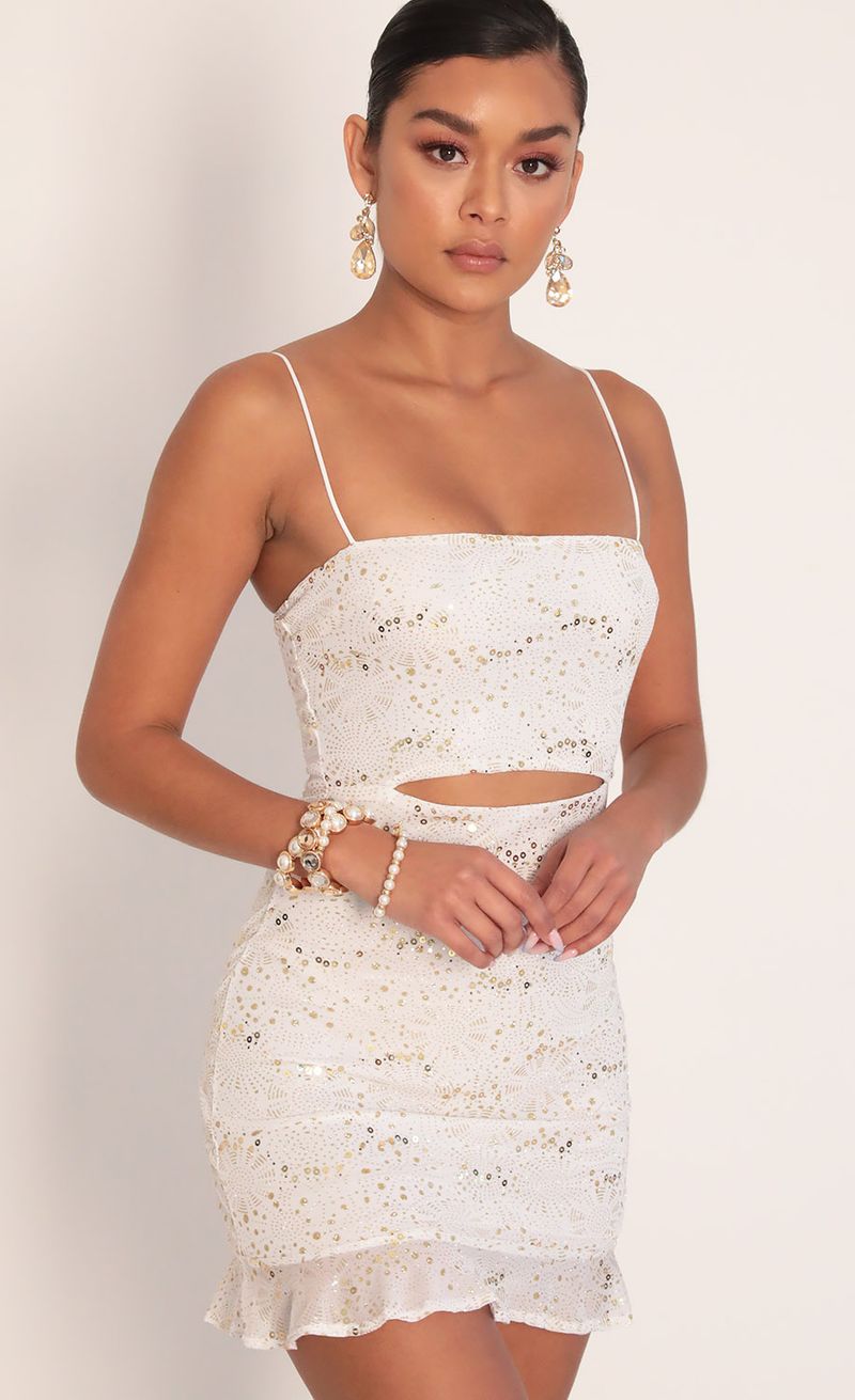 Picture Rae Cutout Ruffle Dress in Ivory Gold. Source: https://media.lucyinthesky.com/data/Feb20_1/800xAUTO/781A9039.JPG