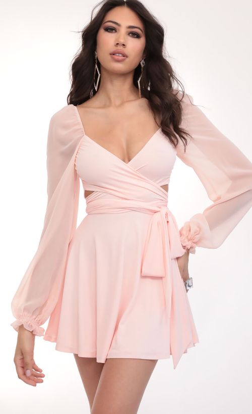 Picture Aliah Puff Chiffon Wrap Dress in Blush. Source: https://media.lucyinthesky.com/data/Feb20_2/500xAUTO/781A6164.JPG