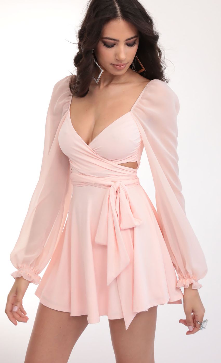 Picture Aliah Puff Chiffon Wrap Dress in Blush. Source: https://media.lucyinthesky.com/data/Feb20_2/850xAUTO/781A6204.JPG