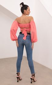 Picture thumb Sadie Off The Shoulder Top in Dotted Coral. Source: https://media.lucyinthesky.com/data/Feb21_1/170xAUTO/1V9A5638.JPG