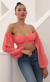 Picture thumb Sadie Off The Shoulder Top in Dotted Coral. Source: https://media.lucyinthesky.com/data/Feb21_1/170xAUTO/AT2A6497.JPG