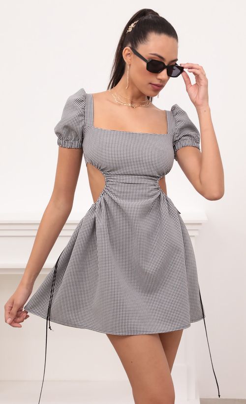 Picture Jenny Puff Sleeve in Gingham. Source: https://media.lucyinthesky.com/data/Feb21_1/500xAUTO/1V9A5292.JPG