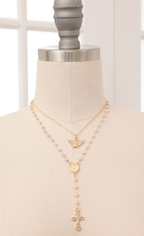 Picture Pearl Rosary in Gold. Source: https://media.lucyinthesky.com/data/Feb21_1/500xAUTO/AT2A9259_COPY.JPG
