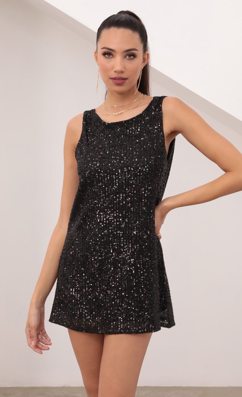 Picture Cowl Back Shift Dress in Black Sequin. Source: https://media.lucyinthesky.com/data/Feb21_1/850xAUTO/1V9A4917.JPG
