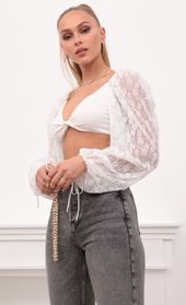 Picture thumb Delaney Lace Puff Sleeve Crop Top in White. Source: https://media.lucyinthesky.com/data/Feb21_2/170xAUTO/1V9A0080.JPG