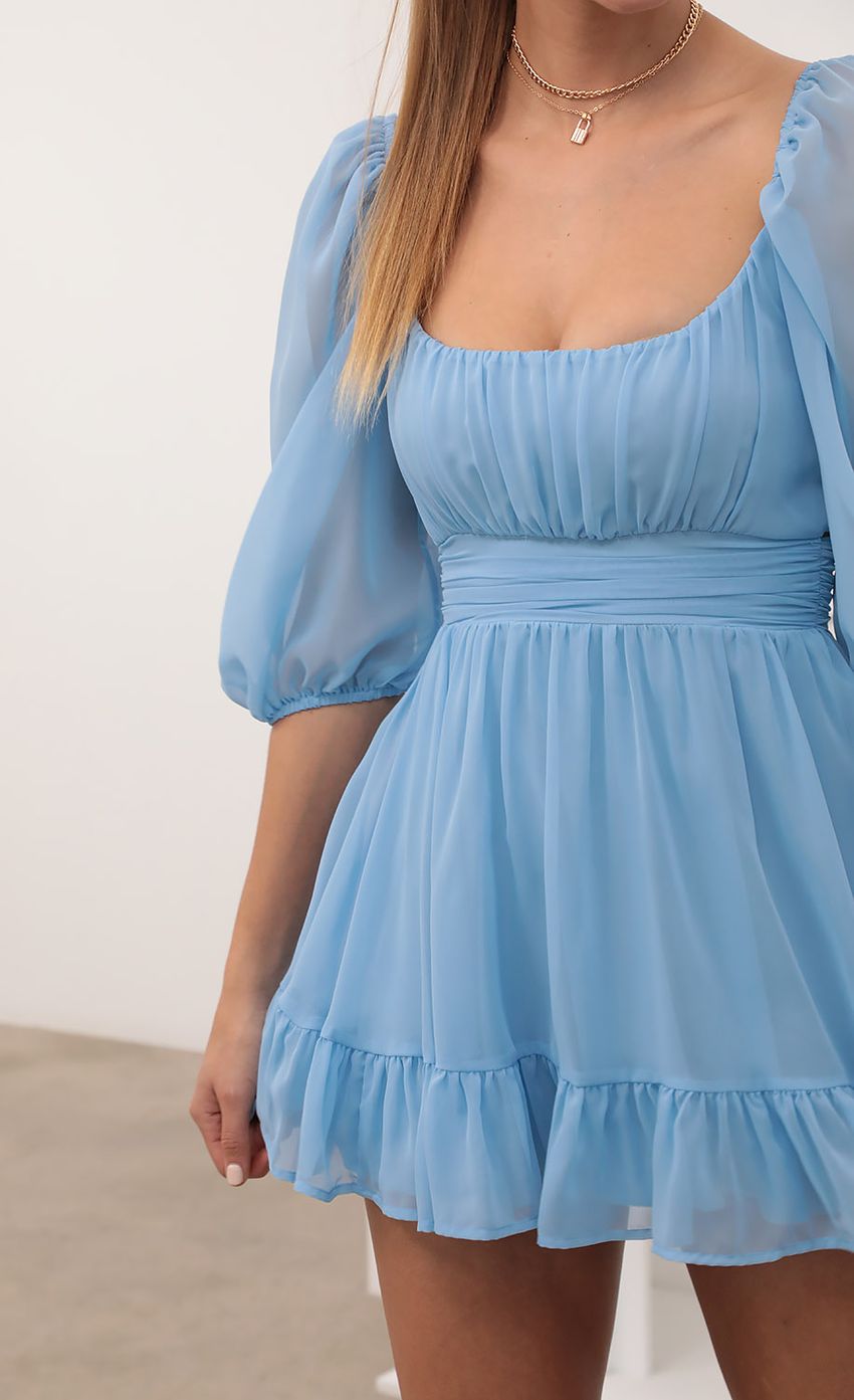 Picture Neia Ruffle Dress in Sky Blue Chiffon. Source: https://media.lucyinthesky.com/data/Feb21_2/850xAUTO/AT2A2745.JPG