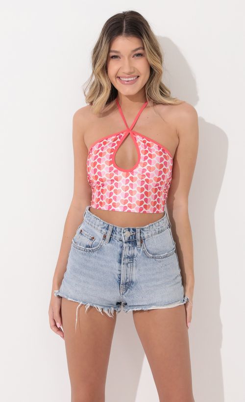 Picture Yvonna Halter Top in Pink Hearts. Source: https://media.lucyinthesky.com/data/Feb22_1/500xAUTO/1V9A1388.JPG