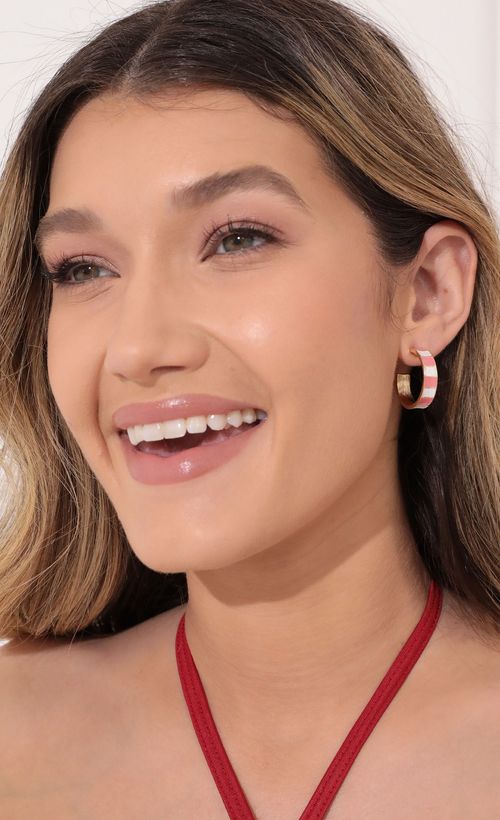Picture Disco Dreams Earring in Pink. Source: https://media.lucyinthesky.com/data/Feb22_1/500xAUTO/1V9A1746.JPG