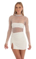 Picture Helia Glitter Sheer Dress in White. Source: https://media.lucyinthesky.com/data/Feb23/150xAUTO/04b03a95-ac2e-4c64-841b-a160f324590d.jpg