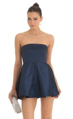 Picture Thelia A-LIne Strapless Dress in Navy Blue. Source: https://media.lucyinthesky.com/data/Feb23/150xAUTO/4f3b4c1c-077a-450d-a7db-22a83187d5c4.jpg