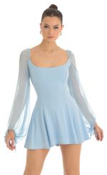 Picture Mehi Glitter Mesh Puff Sleeve Dress in Blue. Source: https://media.lucyinthesky.com/data/Feb23/150xAUTO/70642e7d-7c8e-4e19-bdd6-c6b7cabf77f3.jpg