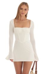 Picture Soraya Corset Long Sleeve Dress in White. Source: https://media.lucyinthesky.com/data/Feb23/150xAUTO/80055bca-b05b-4ab6-9ff2-505c62542ad9.jpg
