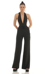 Picture Saga Plunge Halter Jumpsuit in Black. Source: https://media.lucyinthesky.com/data/Feb23/150xAUTO/ddf20ae3-6f86-4aa2-8d9f-87e01aa157af.jpg