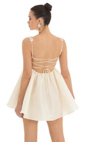 Picture thumb Coco Floral Strap Baby Doll Dress in Cream. Source: https://media.lucyinthesky.com/data/Feb23/170xAUTO/63c97a41-9877-4b7a-a55e-00b4be5285b3.jpg