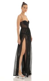 Picture thumb Adema Metallic Knit Maxi Dress in Black. Source: https://media.lucyinthesky.com/data/Feb23/170xAUTO/73280a74-1a9d-4c62-99dc-0529a6ea8190.jpg