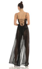 Picture thumb Adema Metallic Knit Maxi Dress in Black. Source: https://media.lucyinthesky.com/data/Feb23/170xAUTO/83e2ef36-4381-47a7-9f13-3f15afbed2e2.jpg
