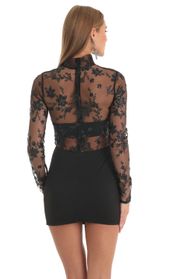Picture thumb Helia Tulle Glitter Sheer Mock Neck Dress in Black. Source: https://media.lucyinthesky.com/data/Feb23/170xAUTO/b175589d-be9f-4595-9332-315daebffaf2.jpg
