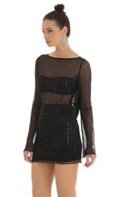 Picture thumb Olean Sequin Striped Long Sleeve Dress in Black. Source: https://media.lucyinthesky.com/data/Feb23/170xAUTO/b3dff20c-78d5-474d-855b-b4098fe54f69.jpg