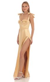 Picture thumb Aries Satin Slit Maxi Dress in Gold. Source: https://media.lucyinthesky.com/data/Feb23/170xAUTO/b6d5418d-7614-4467-a29b-a2b67779f8cf.jpg