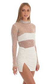 Picture thumb Helia Glitter Sheer Dress in White. Source: https://media.lucyinthesky.com/data/Feb23/170xAUTO/b733f96c-b825-402b-b170-f0d7e11cb96f.jpg