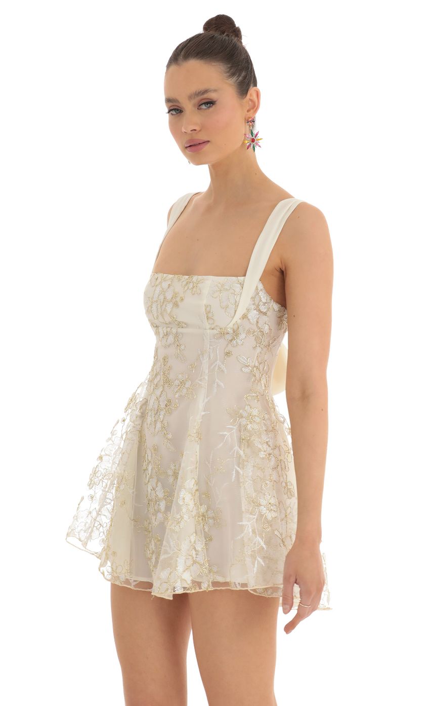 Picture Foxie Floral Sequin Tulle Dress in White. Source: https://media.lucyinthesky.com/data/Feb23/850xAUTO/0890e881-d47a-4a87-aca8-d3aef543017c.jpg
