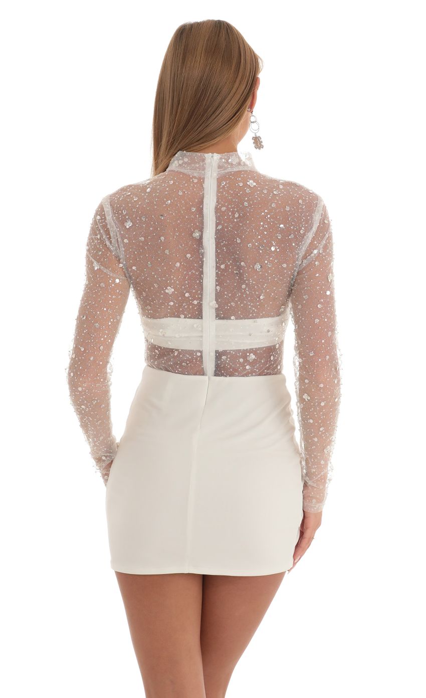 Picture Helia Glitter Sheer Dress in White. Source: https://media.lucyinthesky.com/data/Feb23/850xAUTO/0d70459c-a455-40a6-9fd9-24e8118140ea.jpg