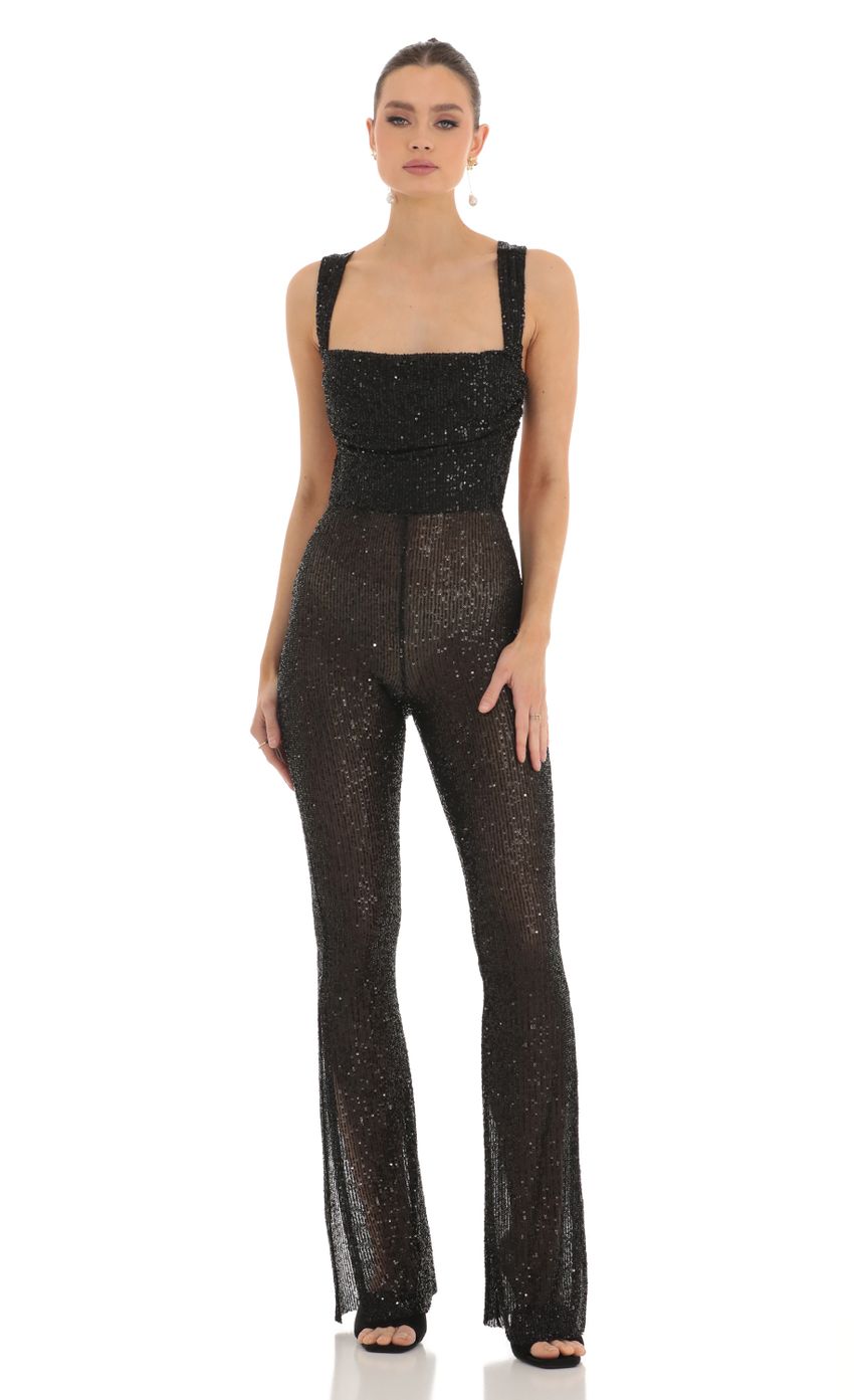 Picture Lupita Sequin Back Bow Tie Slit Jumpsuit in Black. Source: https://media.lucyinthesky.com/data/Feb23/850xAUTO/4b2b0207-f8aa-43c1-ac66-afb658b9161e.jpg