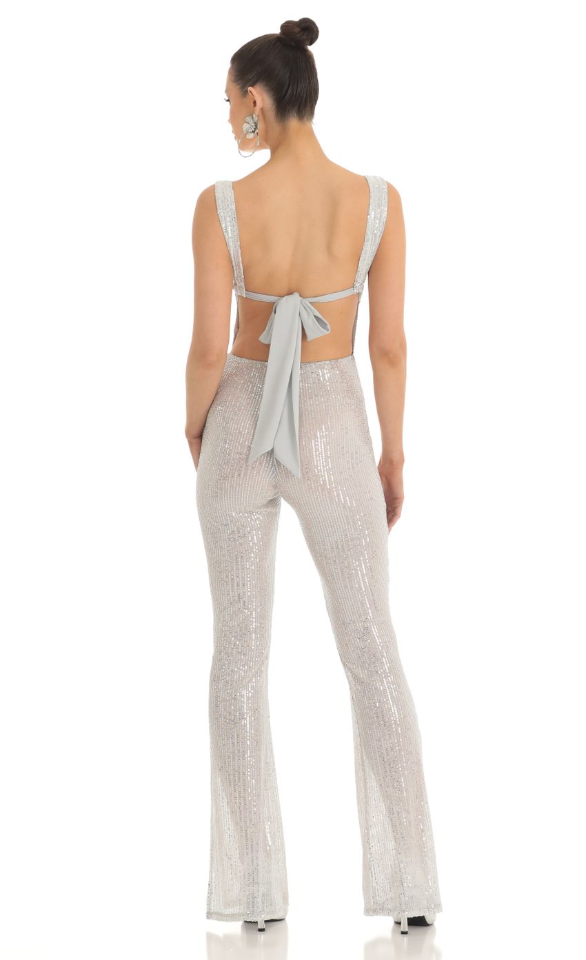Picture Lupita Sequin Wide Leg Slit Jumpsuit in Silver. Source: https://media.lucyinthesky.com/data/Feb23/850xAUTO/5b41e565-fbb2-415f-827a-bfb00b7e0f37.jpg