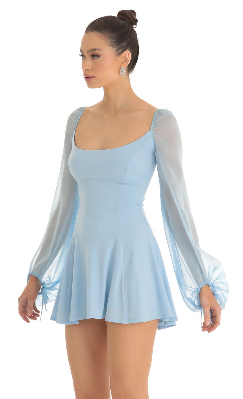 Picture Mehi Sheer Sleeve Dress in Light Blue. Source: https://media.lucyinthesky.com/data/Feb23/850xAUTO/72a14125-5f0f-4d15-a206-d79275f6d2e2.jpg