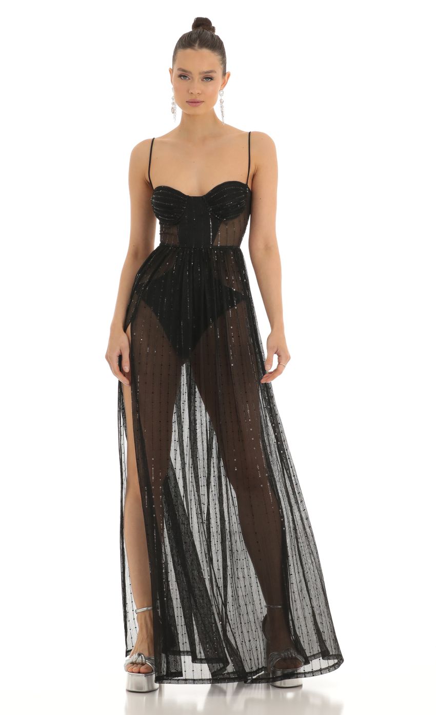 Picture Adema Metallic Knit Maxi Dress in Black. Source: https://media.lucyinthesky.com/data/Feb23/850xAUTO/98b6fd67-fd4b-4157-8a6e-d8a10ef1c84b.jpg