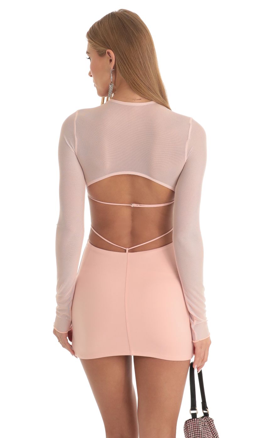 Picture Karlyn Long Sleeve Open Back Dress in Peach. Source: https://media.lucyinthesky.com/data/Feb23/850xAUTO/99ec472f-38dc-4cb8-8255-91562ebed4aa.jpg
