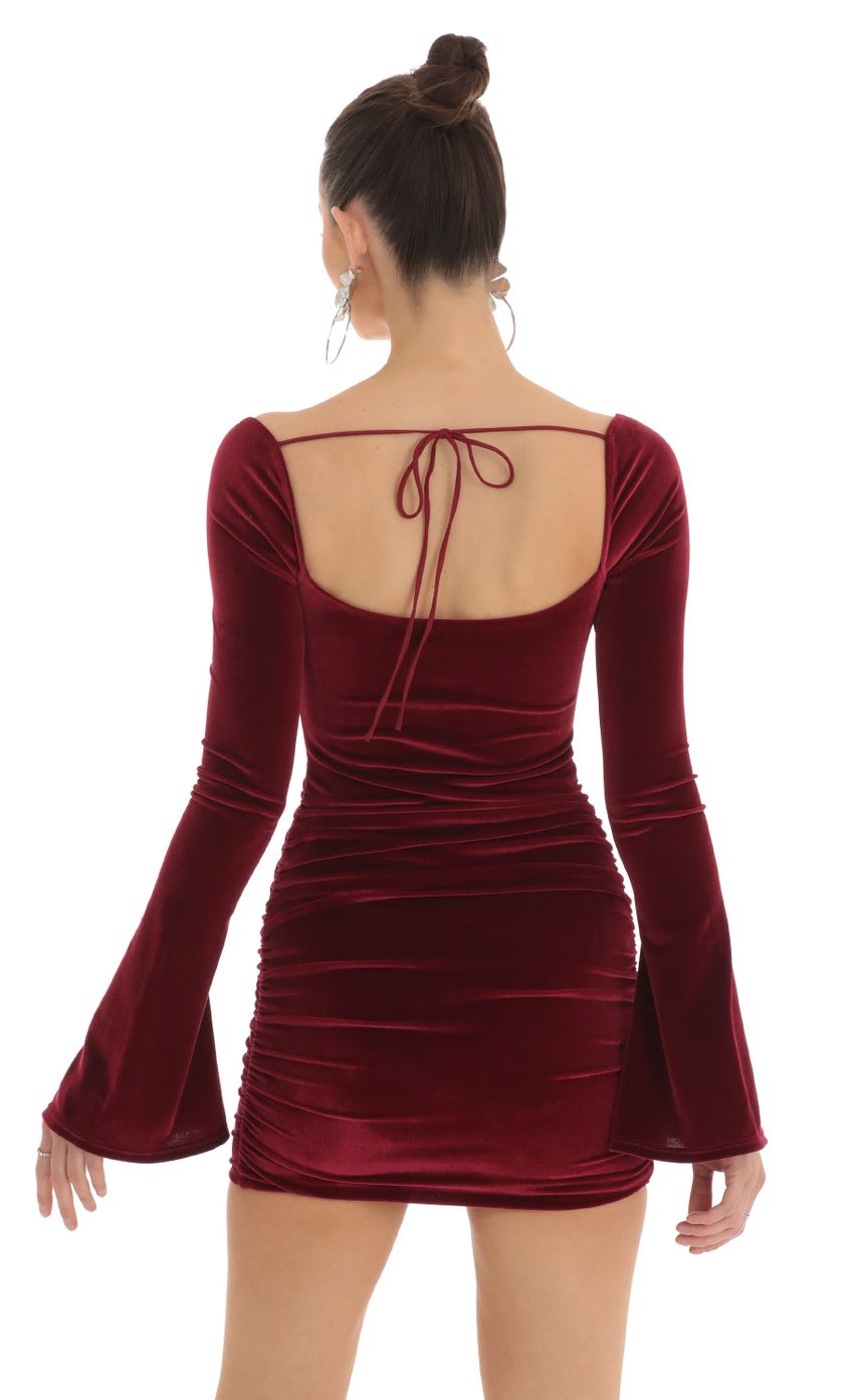 Picture Carmen Velvet Bell Sleeve Dress in Red. Source: https://media.lucyinthesky.com/data/Feb23/850xAUTO/9ebf2512-58e4-4d43-9034-48d019495367.jpg