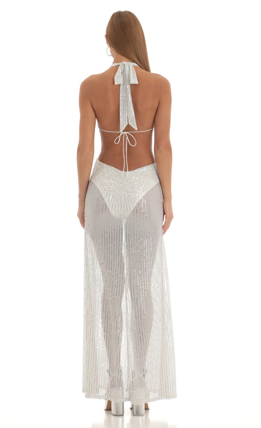 Picture Jaslyn Silver Sequin Halter Maxi Dress in White. Source: https://media.lucyinthesky.com/data/Feb23/850xAUTO/a413ef02-130f-41e2-8067-f0398fa926bc.jpg