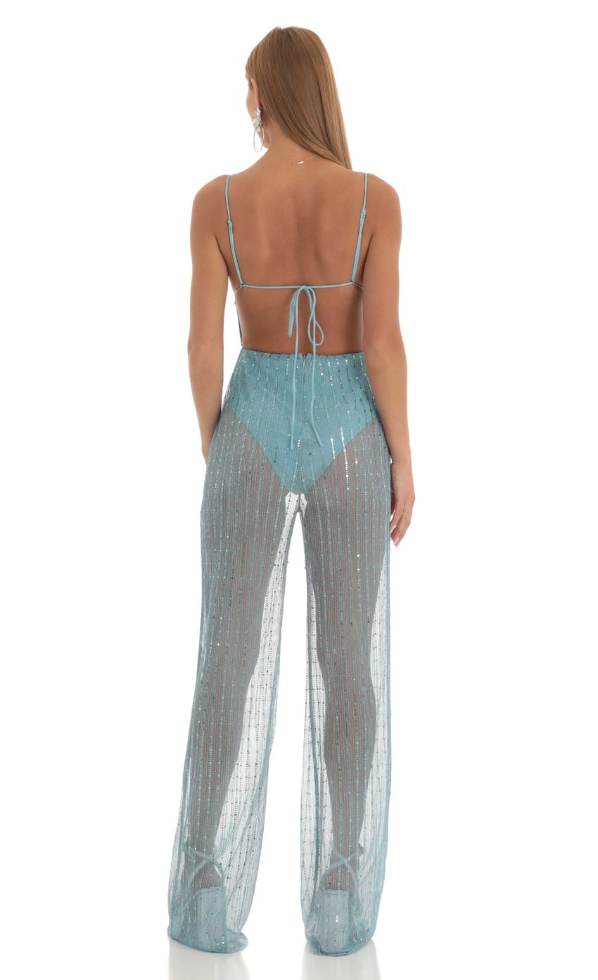 Picture Ceres Sequin Sheer Wide Leg Jumpsuit in Sky Blue. Source: https://media.lucyinthesky.com/data/Feb23/850xAUTO/adc29b1e-124c-4da3-9120-e3f41fc34c88.jpg