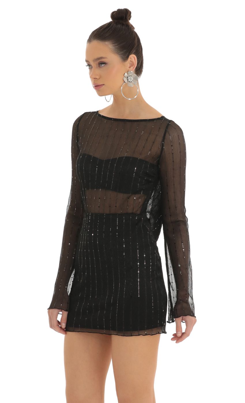 Picture Olean Sequin Striped Long Sleeve Dress in Black. Source: https://media.lucyinthesky.com/data/Feb23/850xAUTO/b3dff20c-78d5-474d-855b-b4098fe54f69.jpg