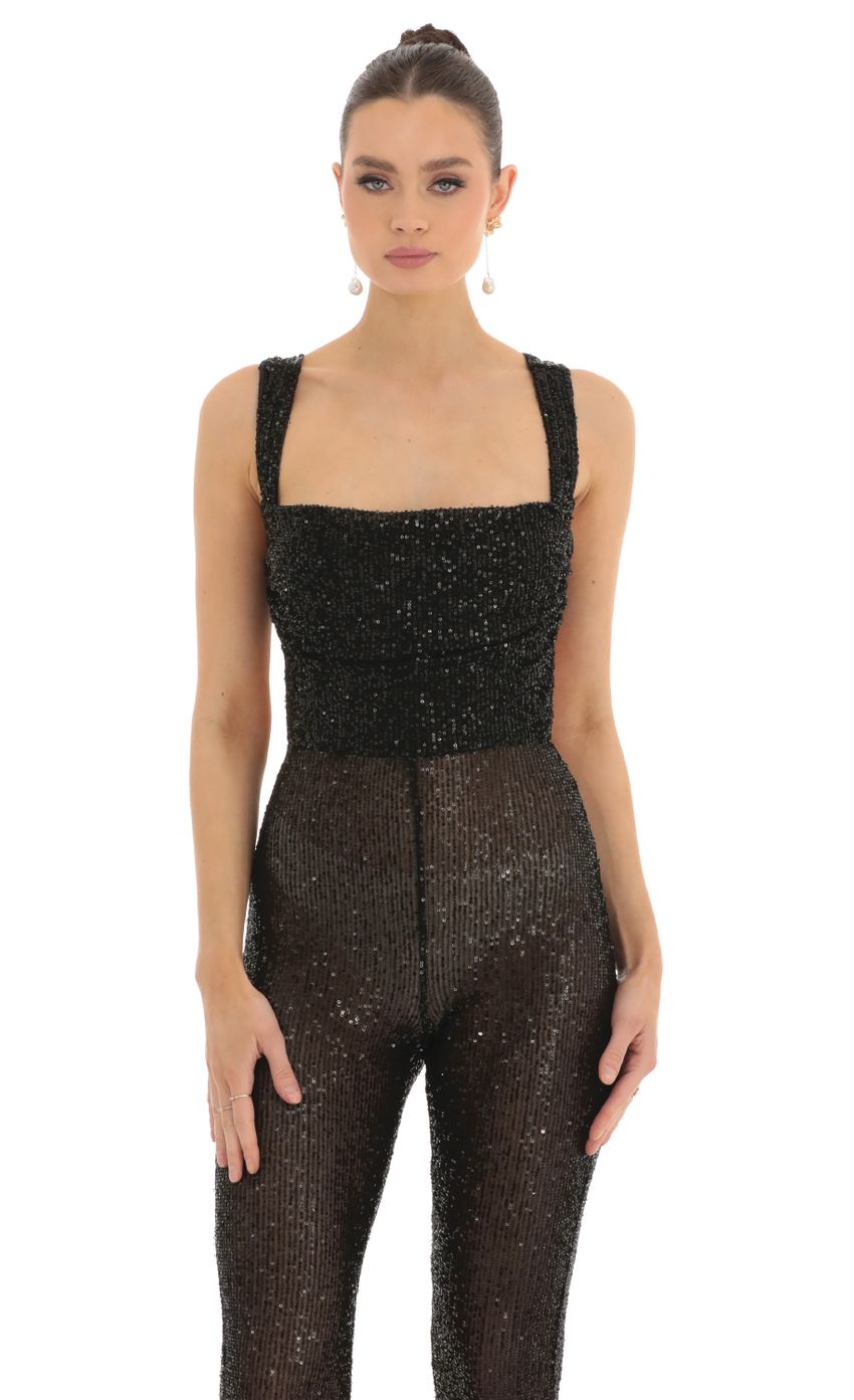Picture Lupita Sequin Back Bow Tie Slit Jumpsuit in Black. Source: https://media.lucyinthesky.com/data/Feb23/850xAUTO/c574f226-9b3b-4ba0-8abf-4839cd9992a2.jpg