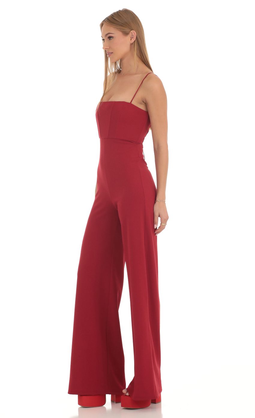Picture Jorden Wide Leg Corset Jumpsuit in Red. Source: https://media.lucyinthesky.com/data/Feb23/850xAUTO/d0def60f-e99c-4b6d-a589-79aea60d352f.jpg